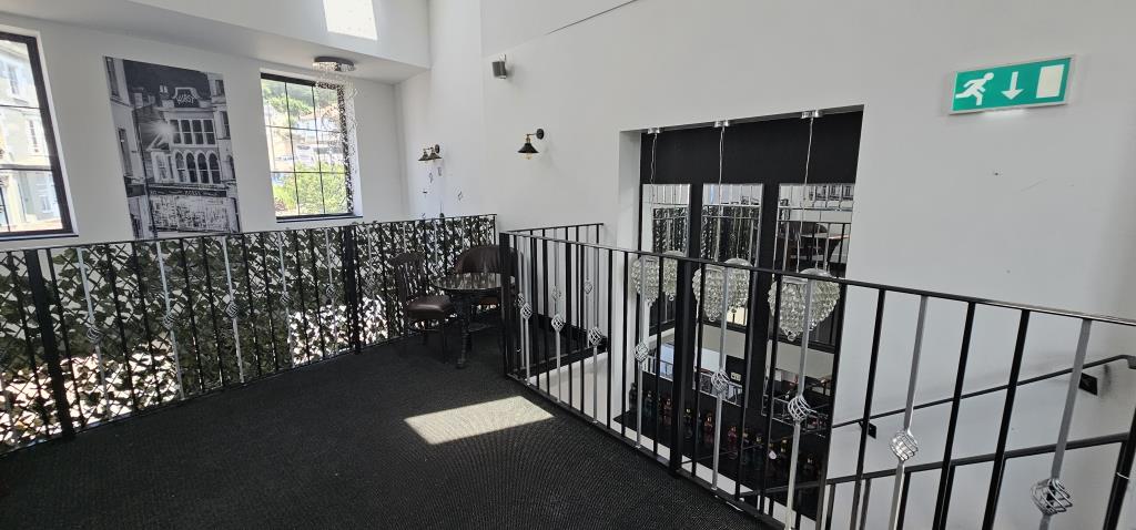 Lot: 79 - TOWN CENTRE FREEHOLD THREE STOREY BAR WITH GARDEN AND PARKING - The upper floor food/bar area